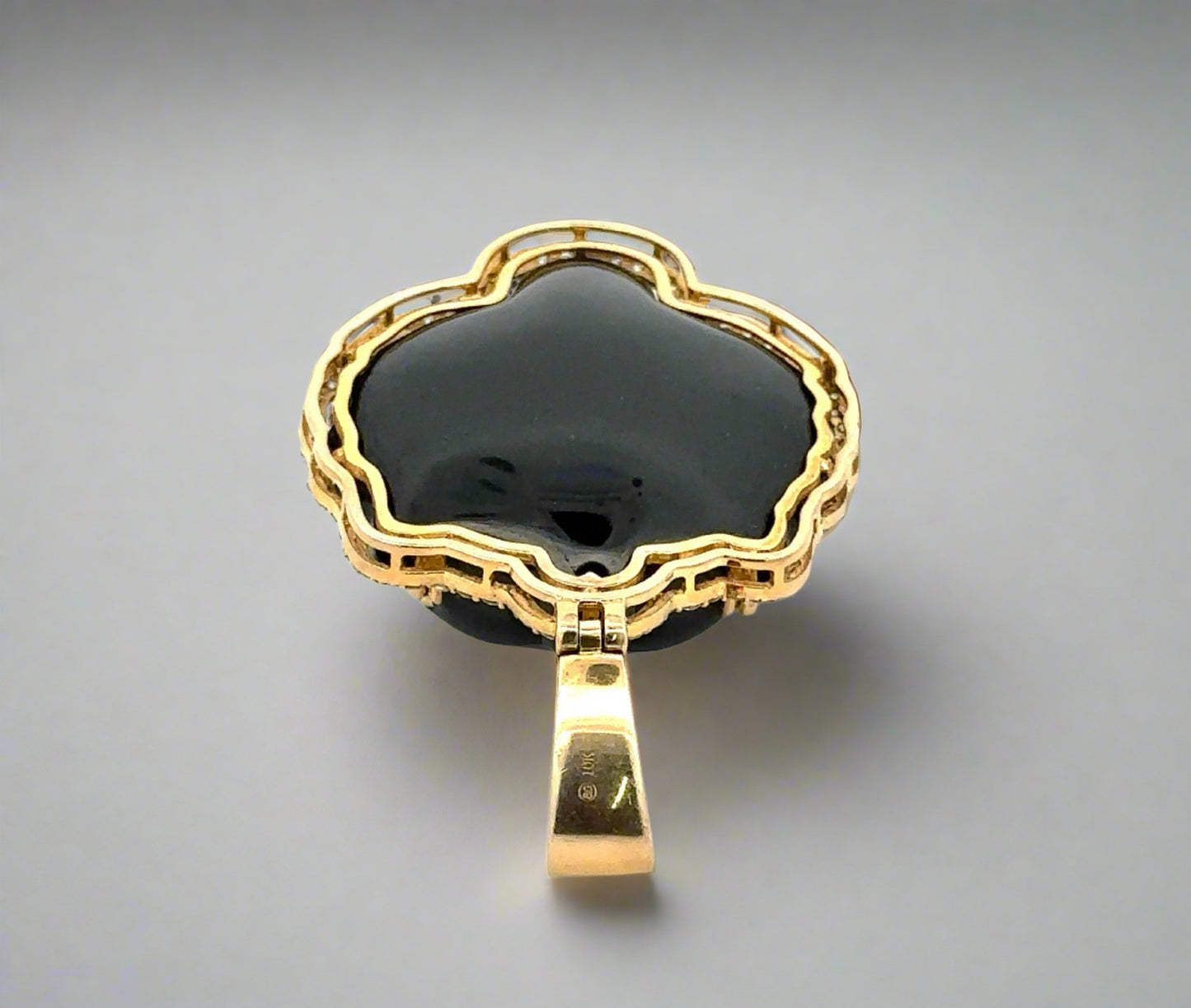 Back of pendant with 10K stamp on bail