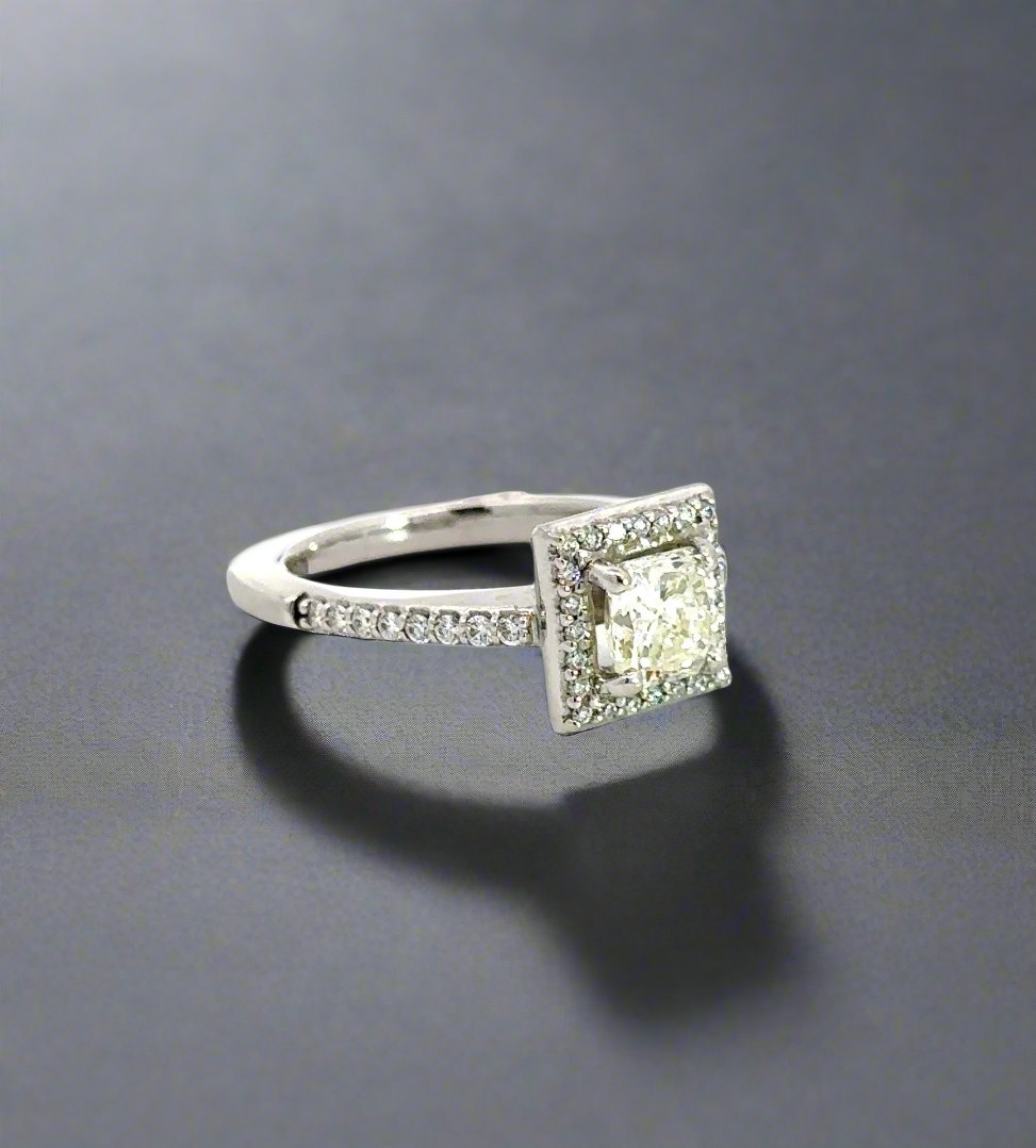 Diagonal view of white gold princess-cut ring