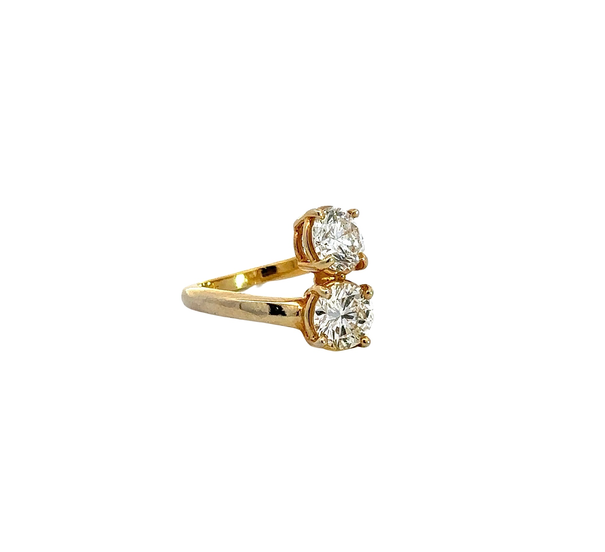 Diagonal view of 2-stone diamond engagement ring in yellow gold
