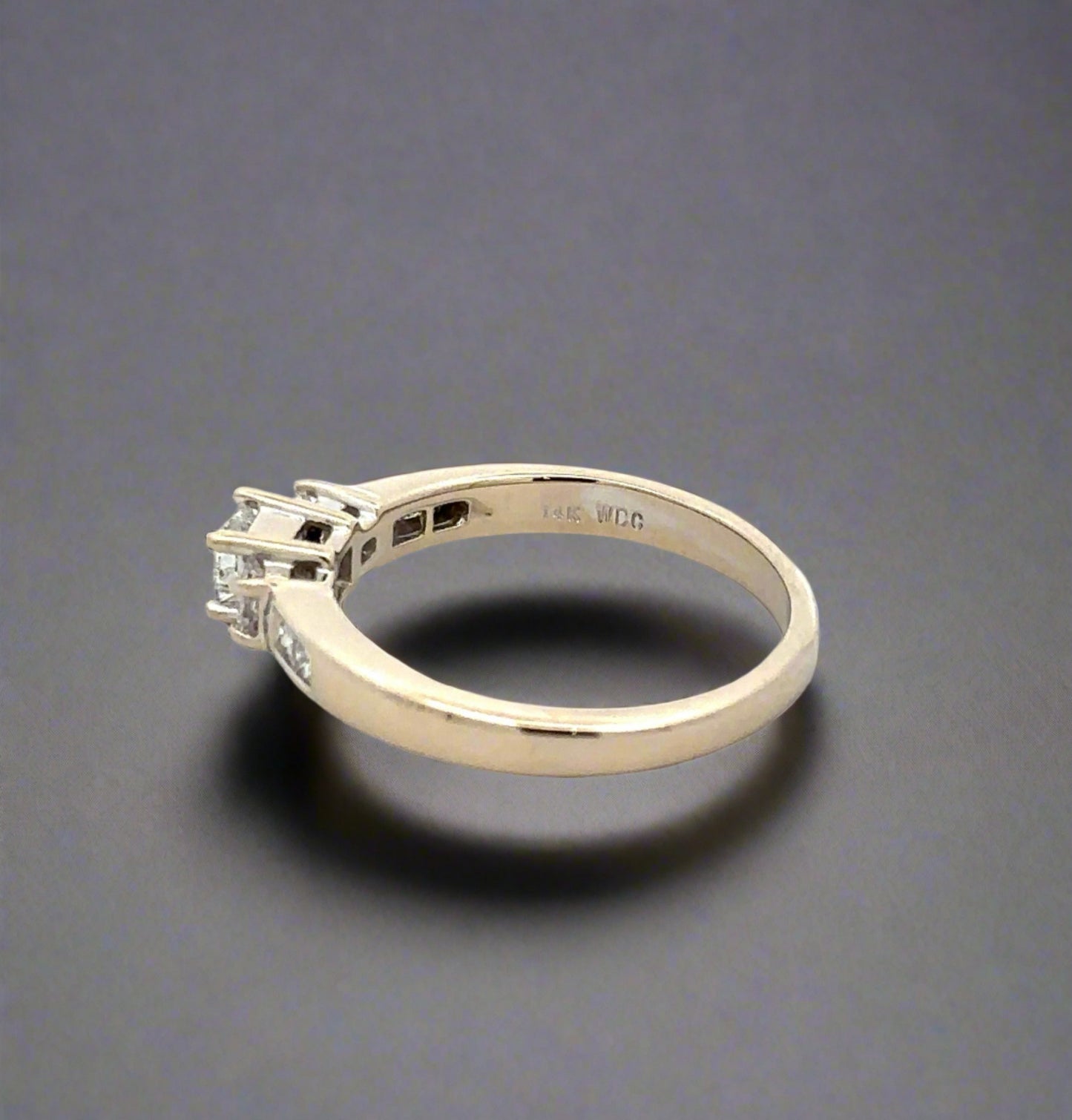 Inside of ring with 14K stamp and "WDC" engraved