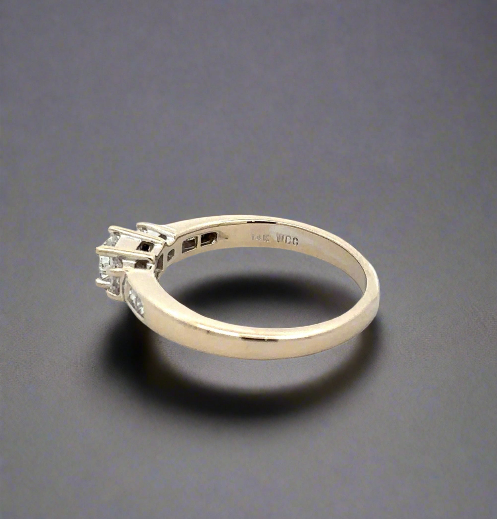 Inside of ring with 14K stamp and "WDC" engraved