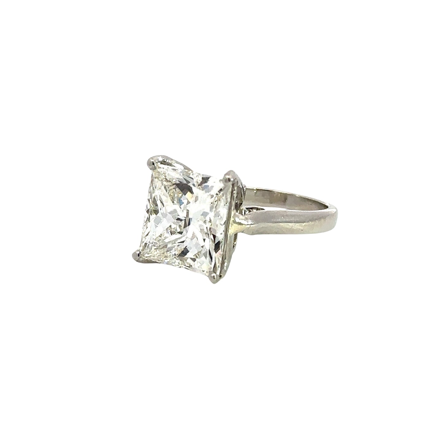 Diagonal view of 5.04 carat princess-cut diamond ring in platinum