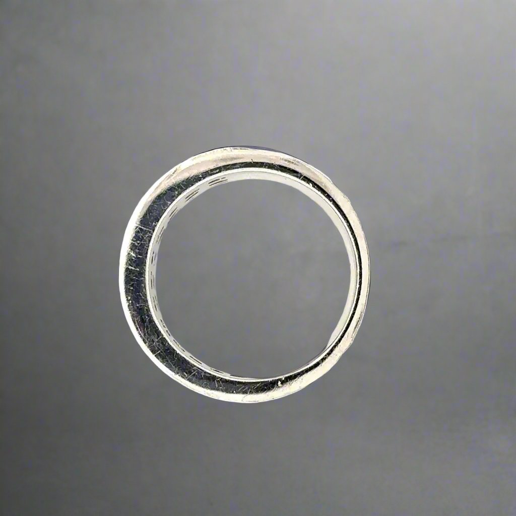 top of white gold ring with scratches on gold