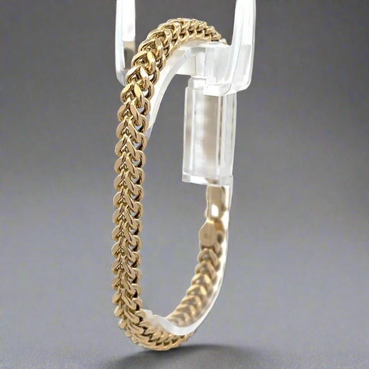Diagonal view of square yellow gold franco bracelet
