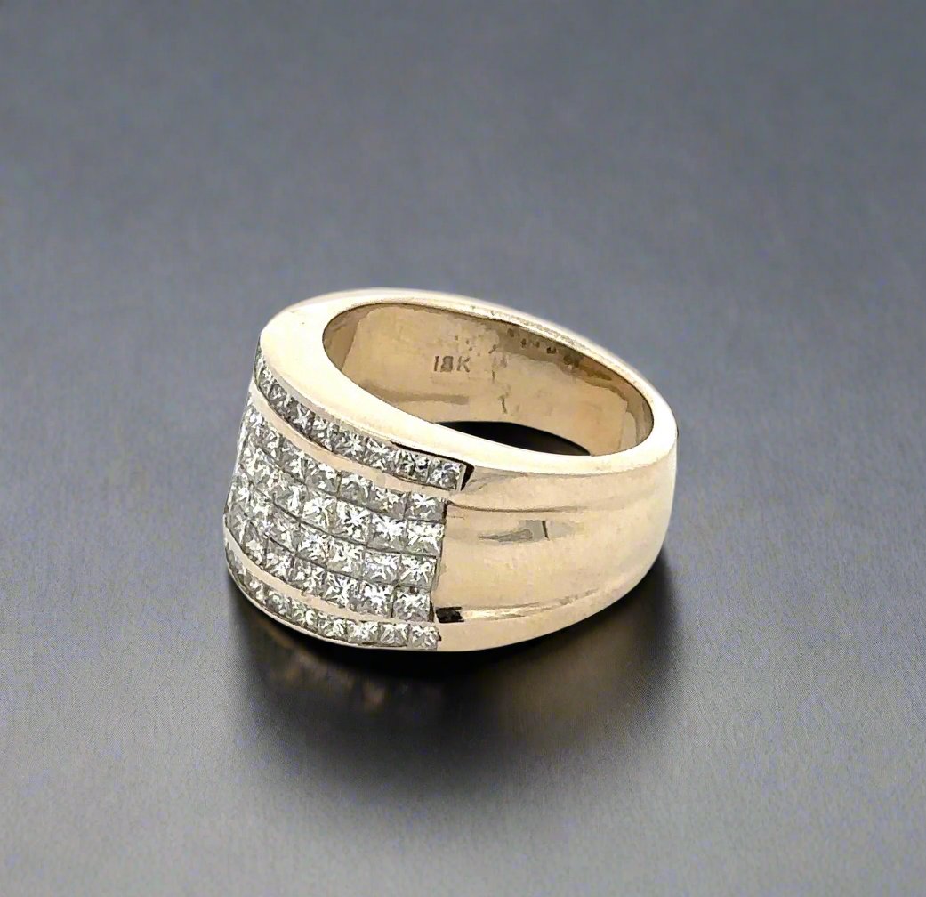 white gold ring with 6 rows of princess-cut diamonds and 18K stamp inside band