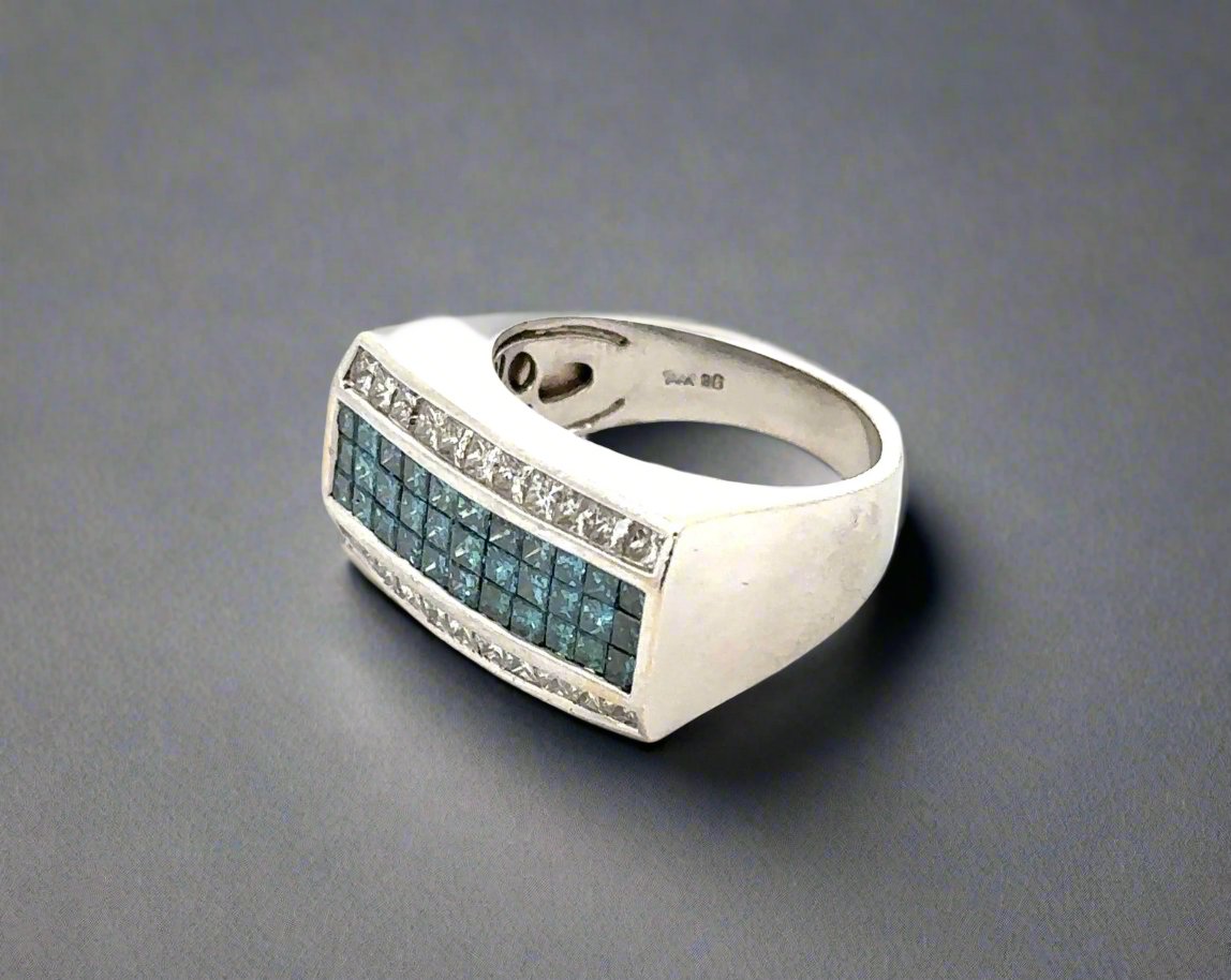 diagonal view of white gold ring with 14K stamp inside band