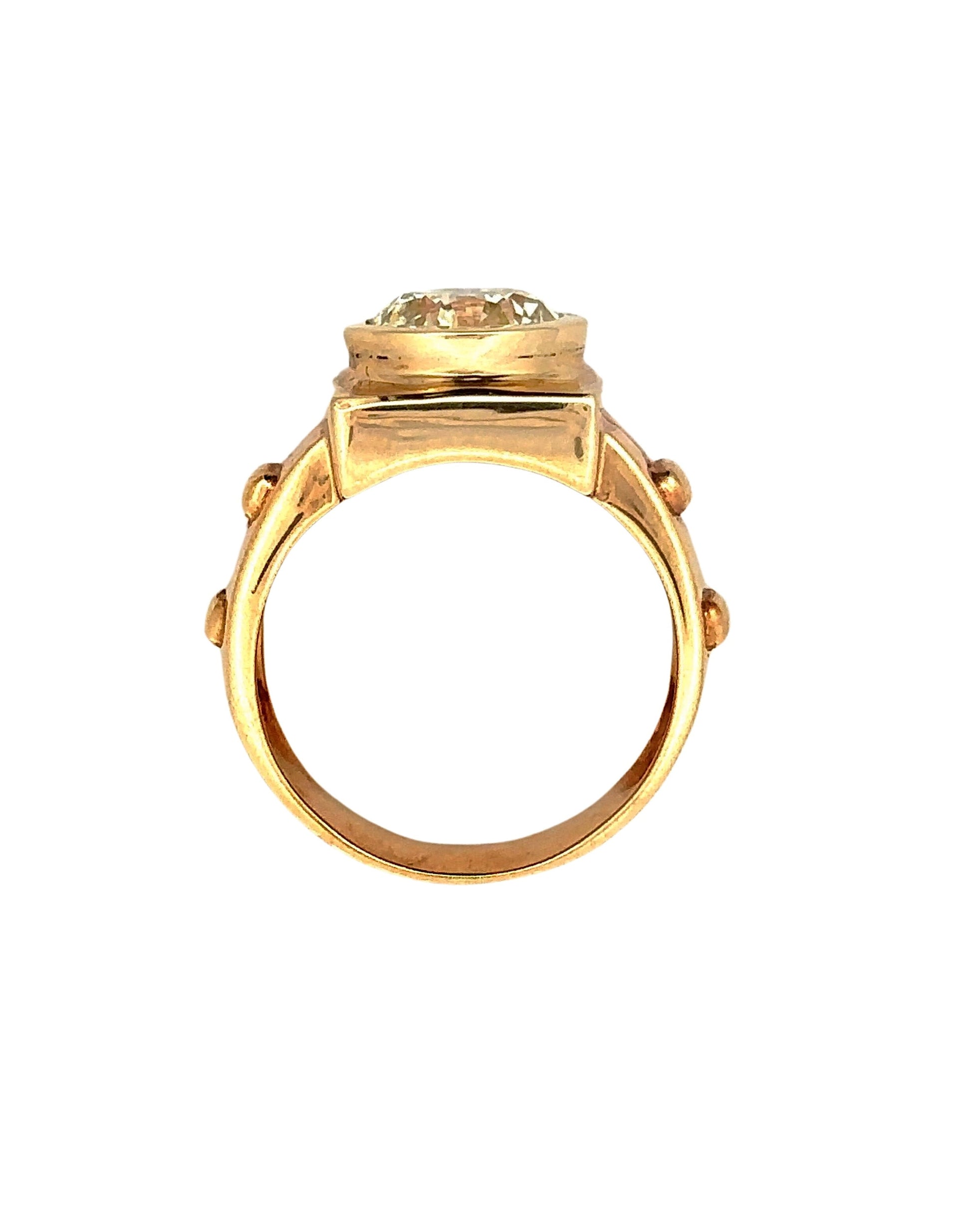 top of yellow gold ring with scratches on gold