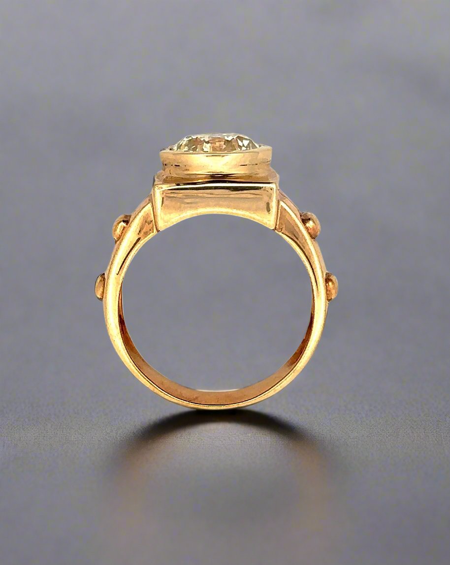 top of yellow gold ring with scratches on gold