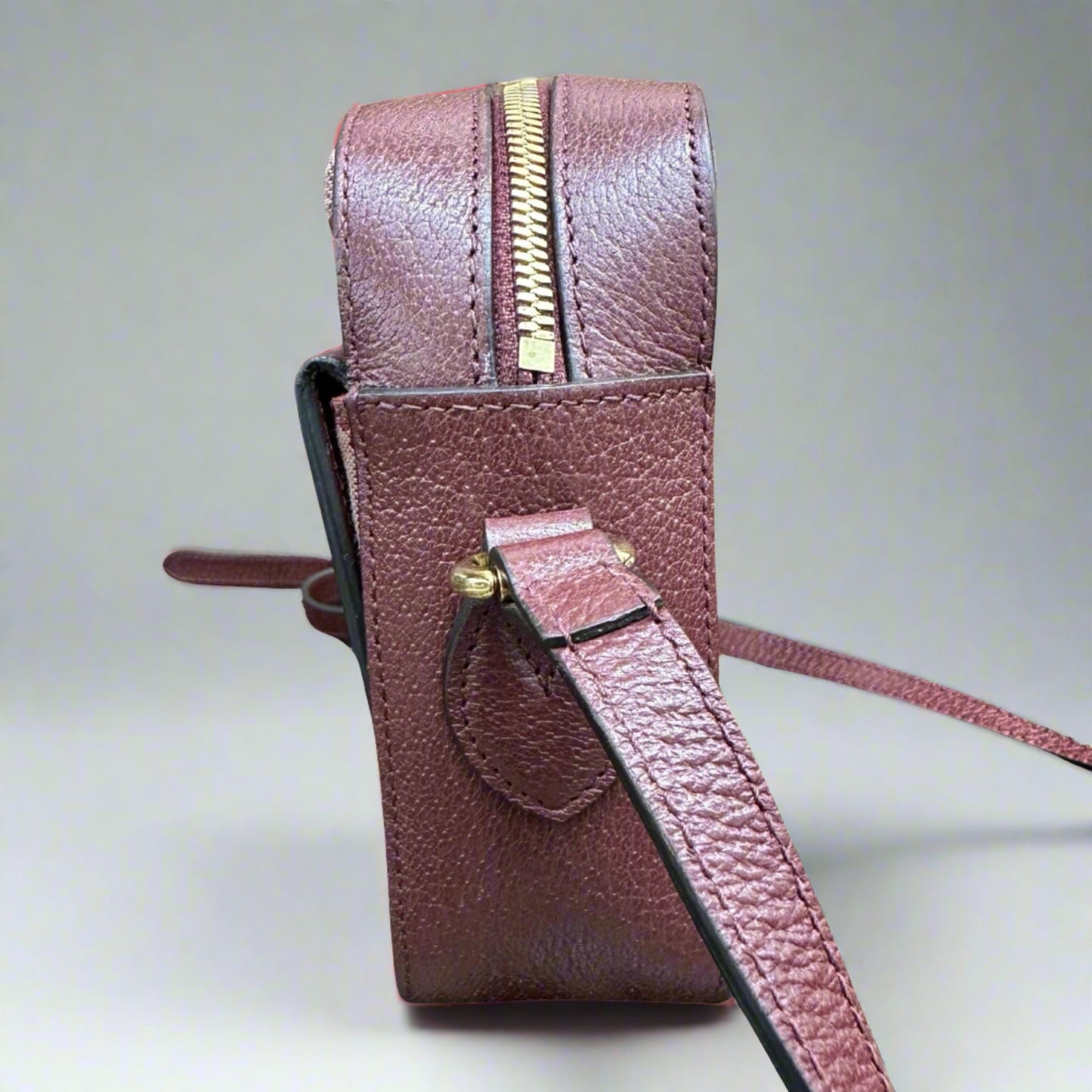 Side of Burgundy bag