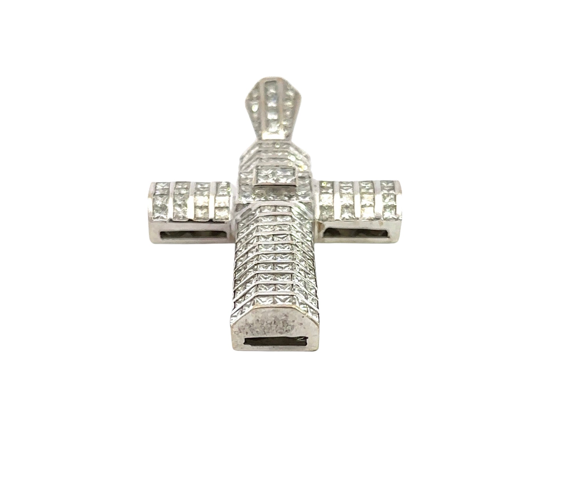 Bottom of white gold cross pendant with marks on the gold