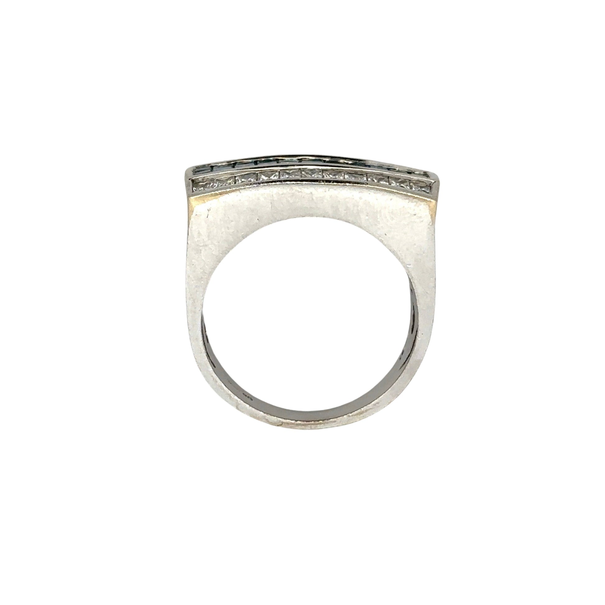 top of white gold ring with signs of wear on gold