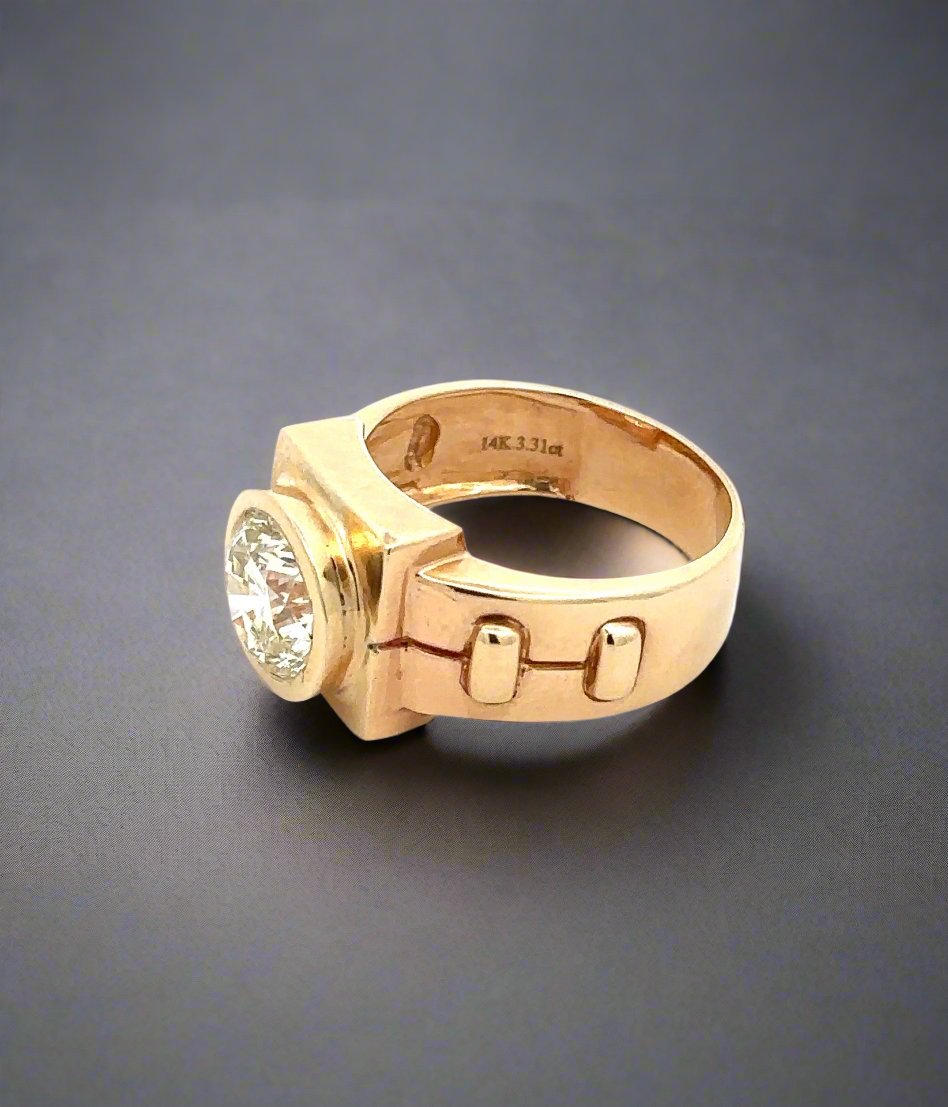 diagonal view of yellow gold ring with 14K 3.31ct stamp inside