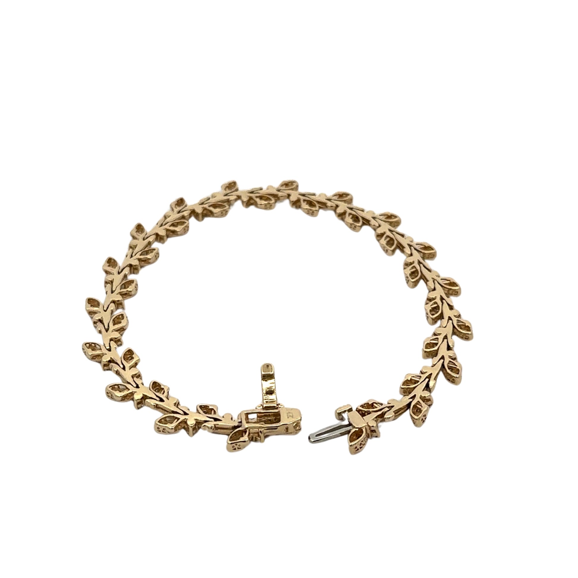Back of diamond leaf bracelet with yellow gold and 14K stamp on clasp