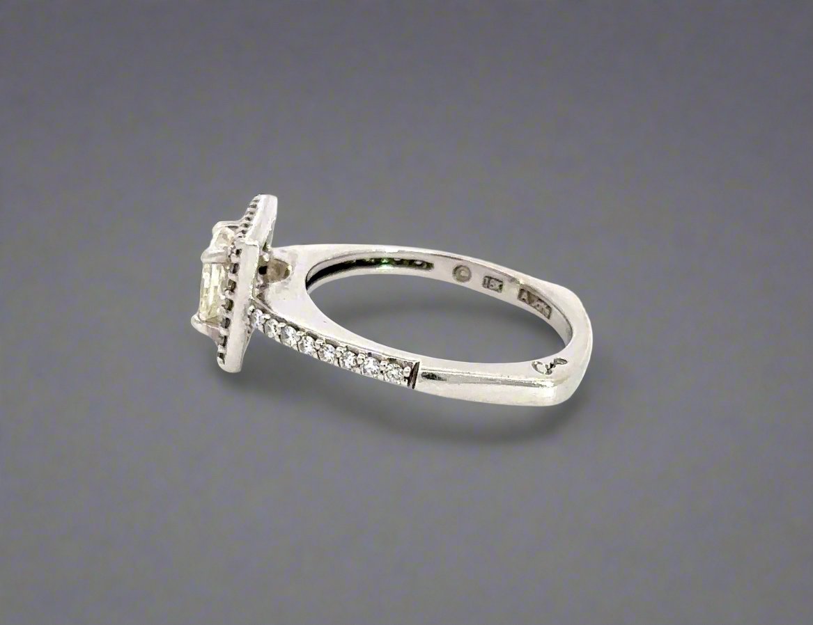 Side of white gold ring with scratches on gold