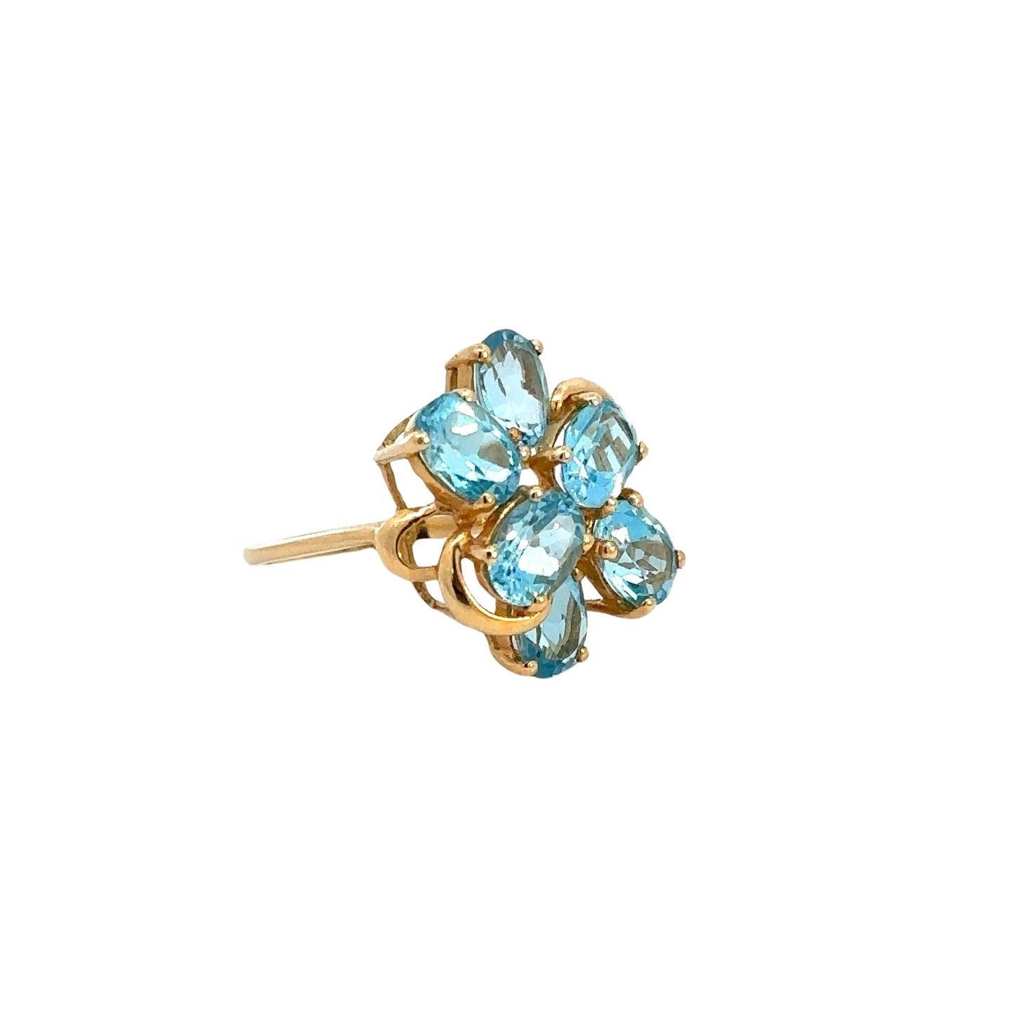 Diagonal view of 6 blue gemstone ring in yellow gold