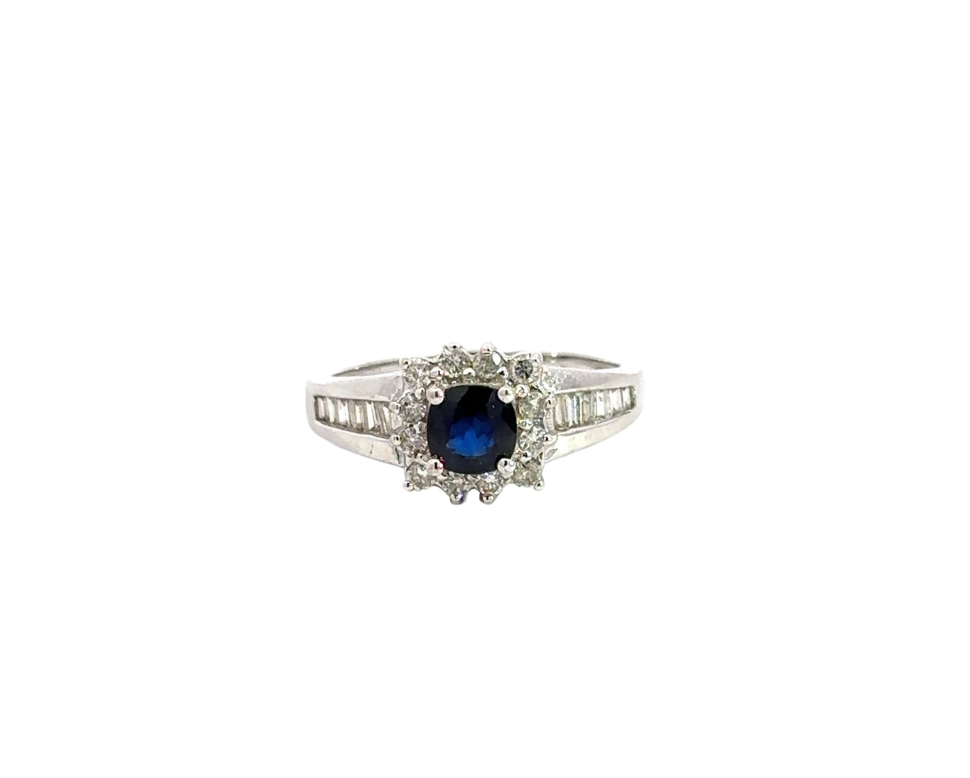 Front of white gold ring with blue gemstone and diamonds