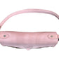 Top of handbag with pink flap closure