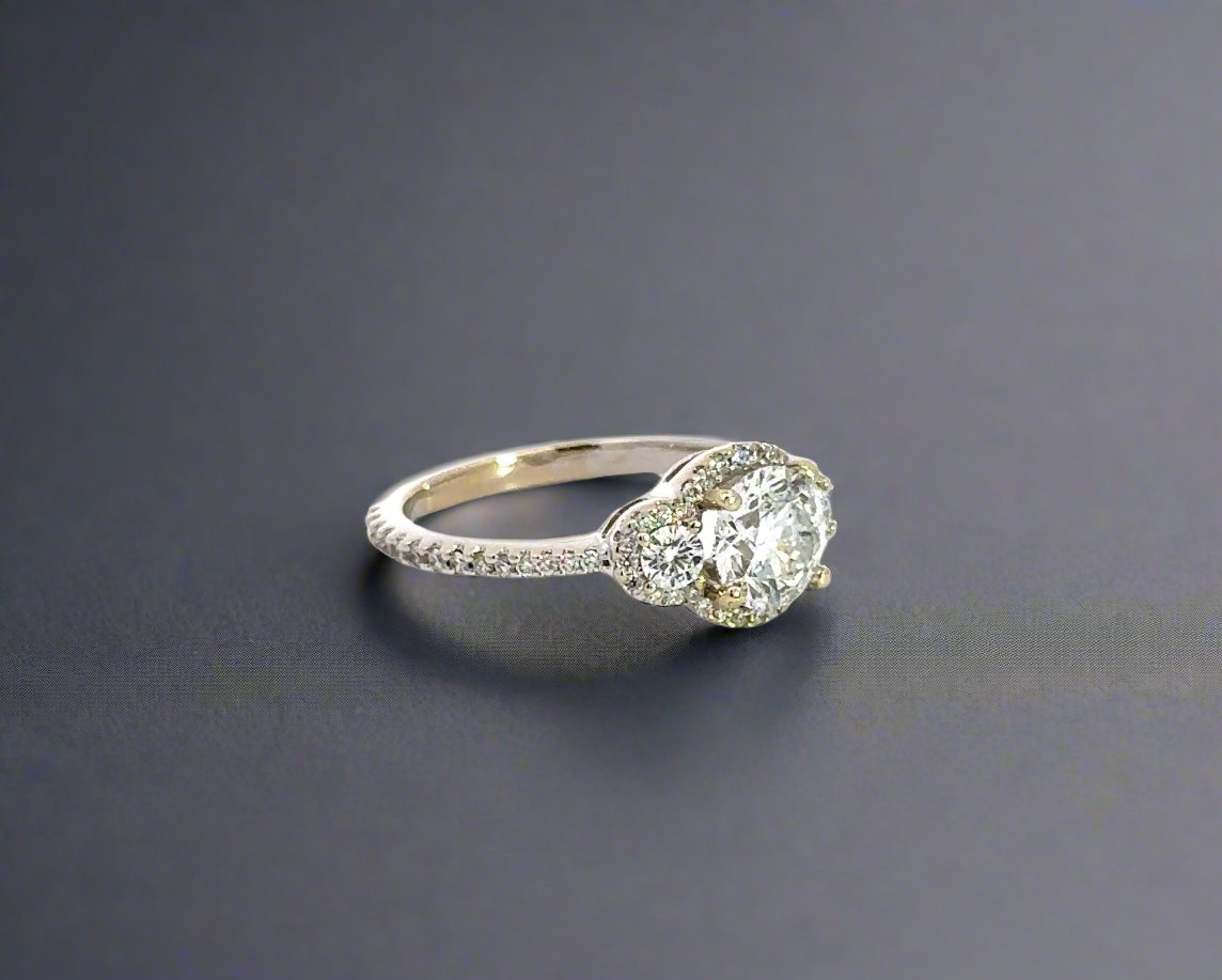 Diagonal view of white gold 3 stone diamond ring