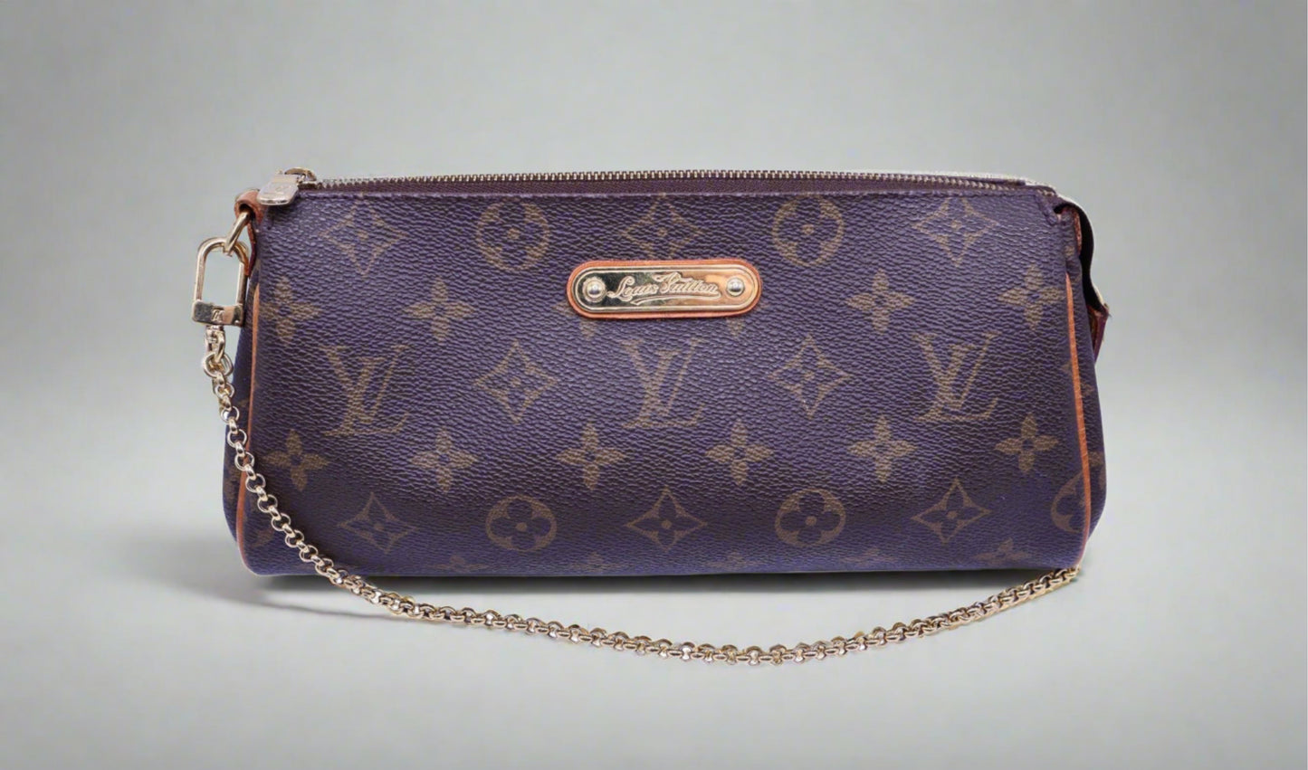 Brown Monogram Louis Vuitton clutch with gold strap