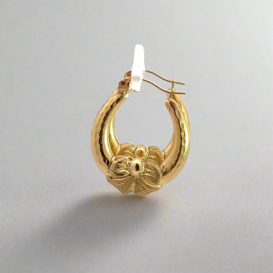 360 video of yellow gold hoops with bow detailing
