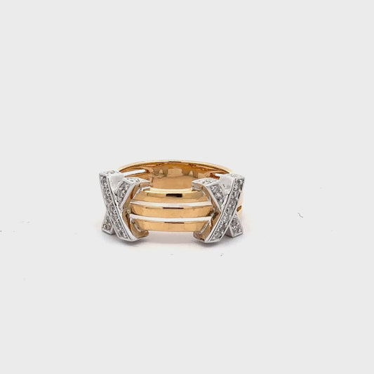 360 Video of white + yellow gold XX ring. Front of ring is open between gold.