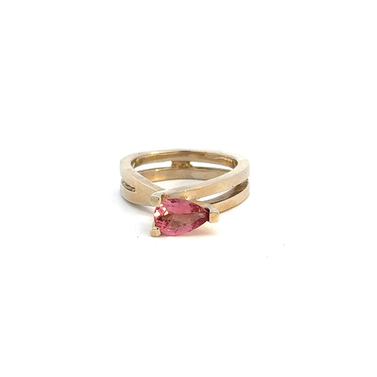 360 video of yellow gold infinity sign ring with pink pear-shaped gemstone