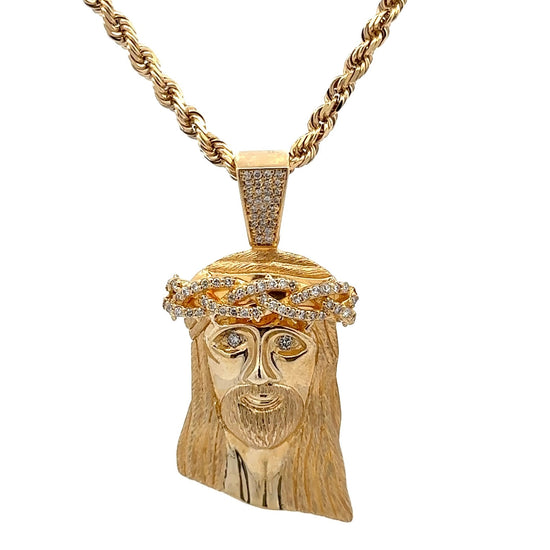 360 video of yellow gold rope chain and diamond jesus head pendant