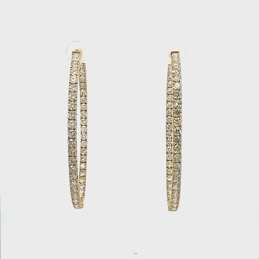 360 Video of yellow gold large diamond hoops with diamonds on front and inside of hoops
