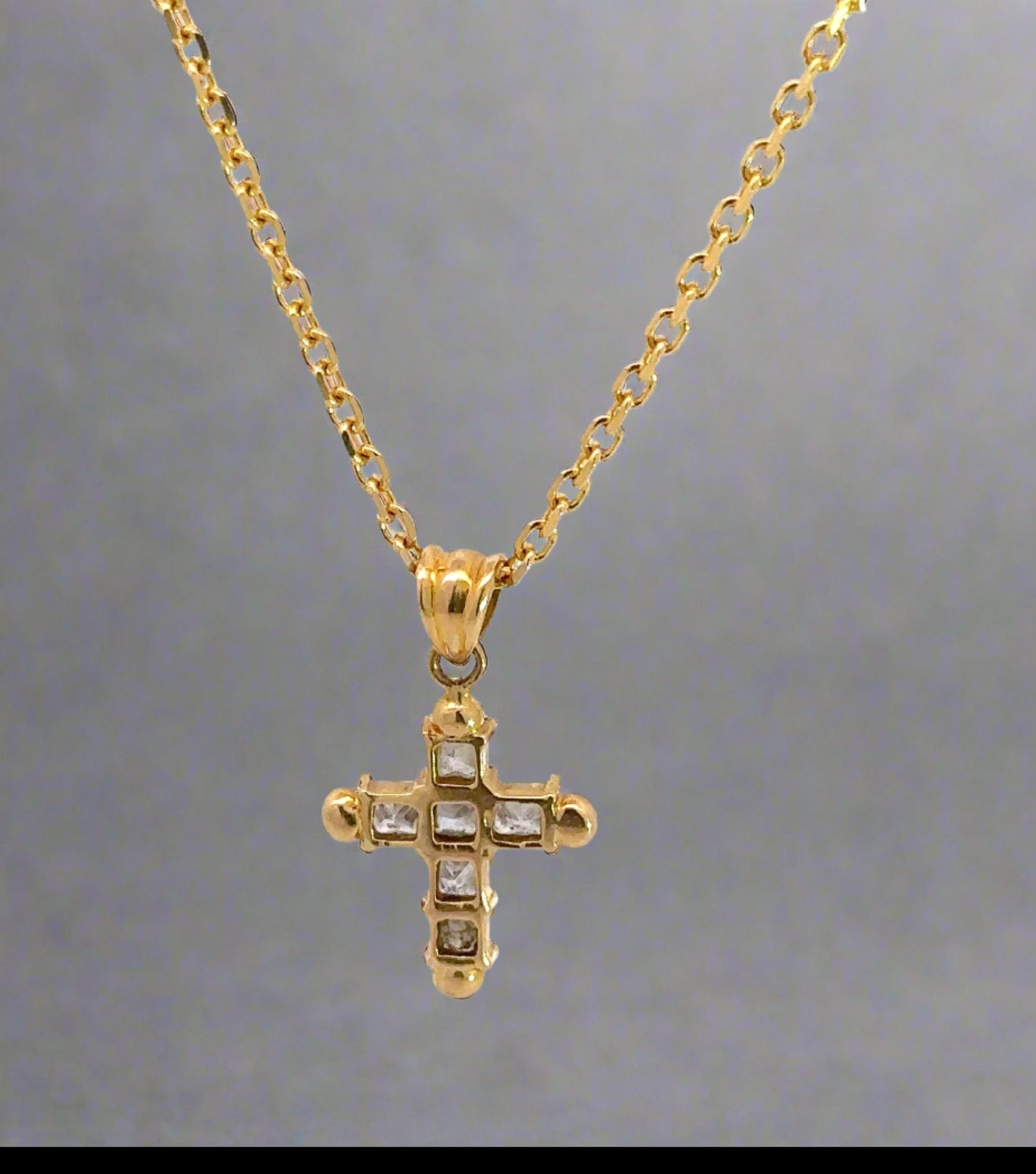 Back of Diamond Cross Necklace with open gold