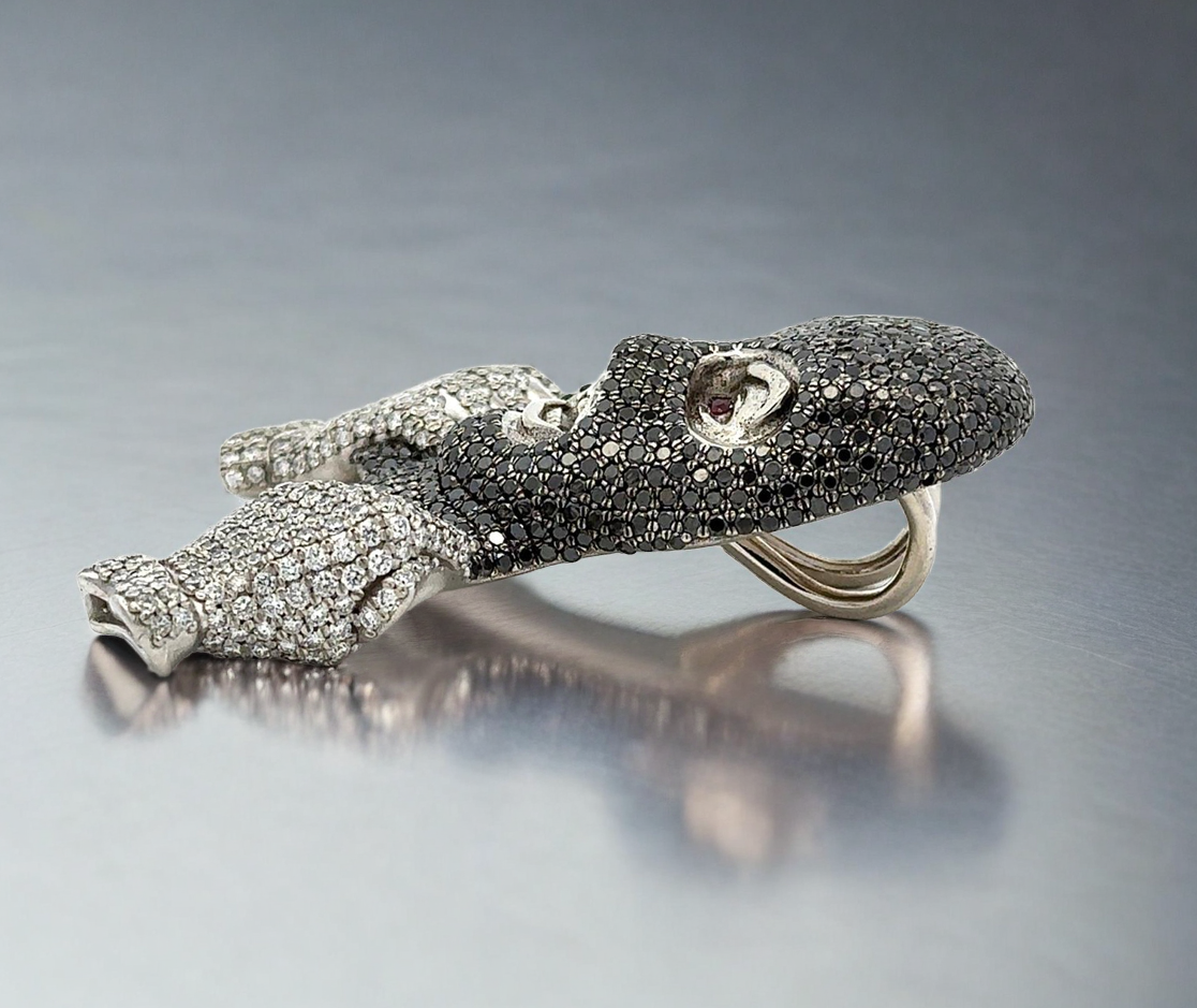 Ski mask face diamond pendant resembling a mask with gemstone details on a gray background