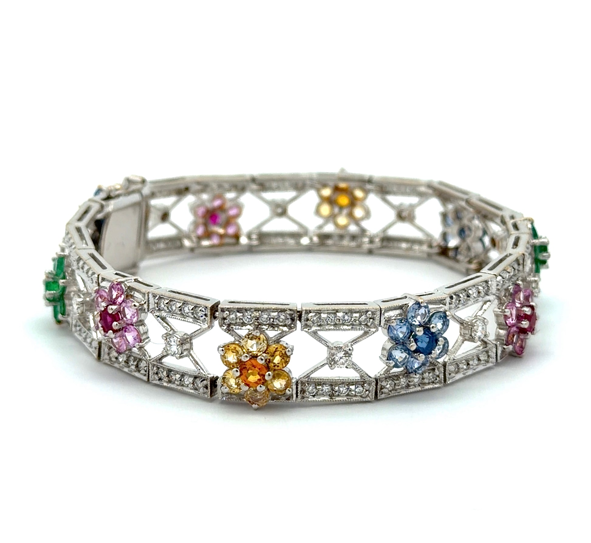 White gold bracelet with colorful gemstones and diamonds on a white background