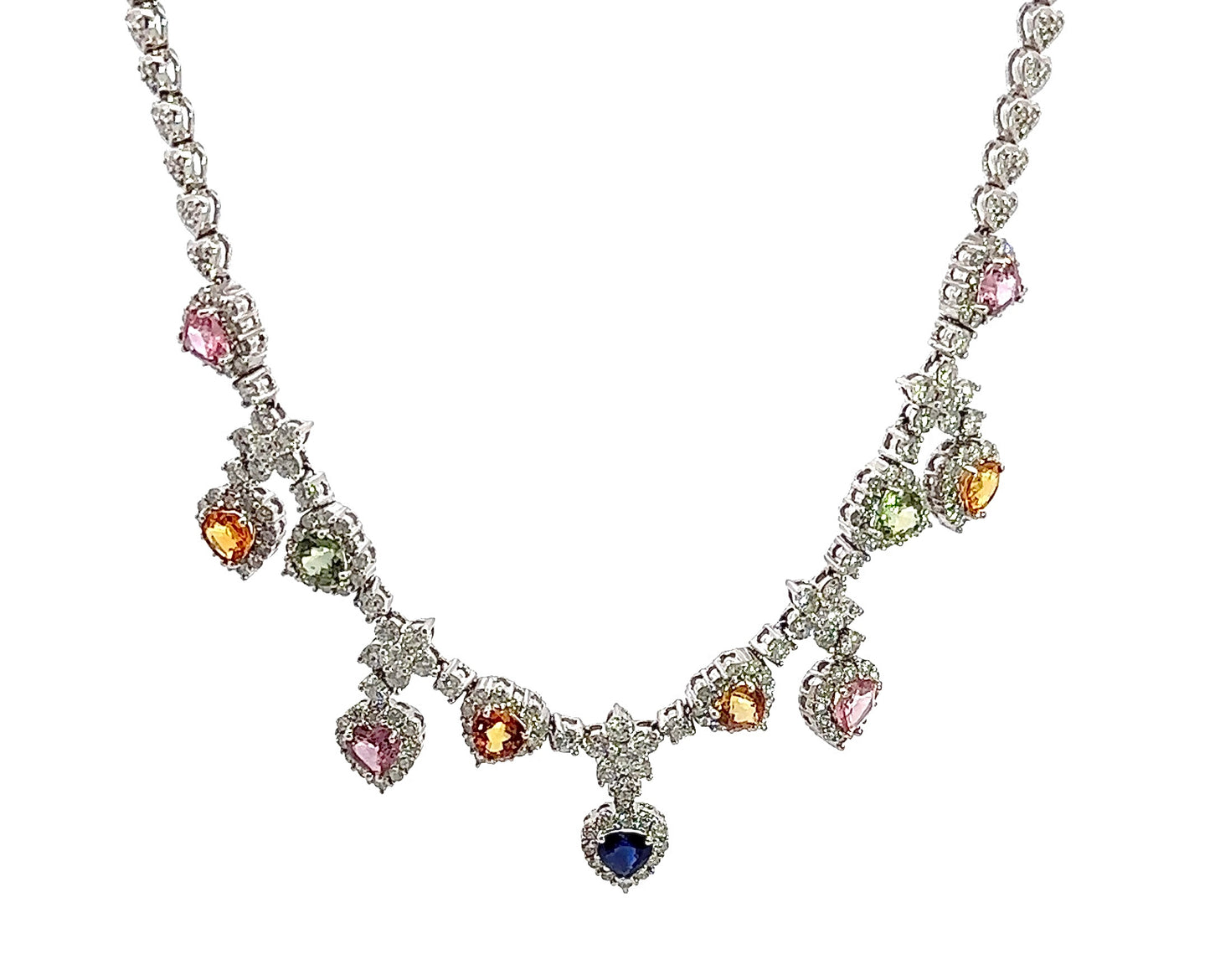 hanging white gold diamond necklace with 4 pink heart-shaped stones, 4 orange heart shaped stones, 2 green heart shaped stones, and 1 centered blue heart shape stone