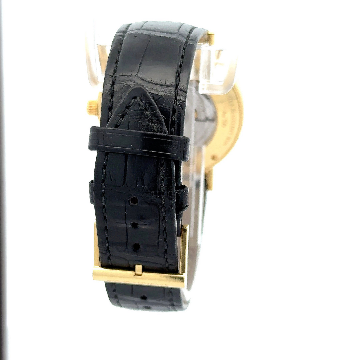 Back of the black leather band with 18K yellow gold watch clasp. Leather band has wear.