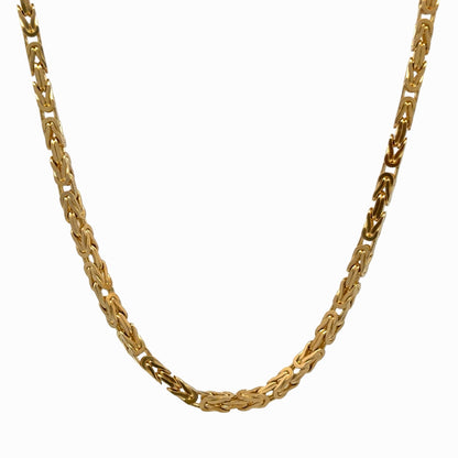 Close-up of the 14K yellow gold fancy link necklace showing the intricate chain pattern