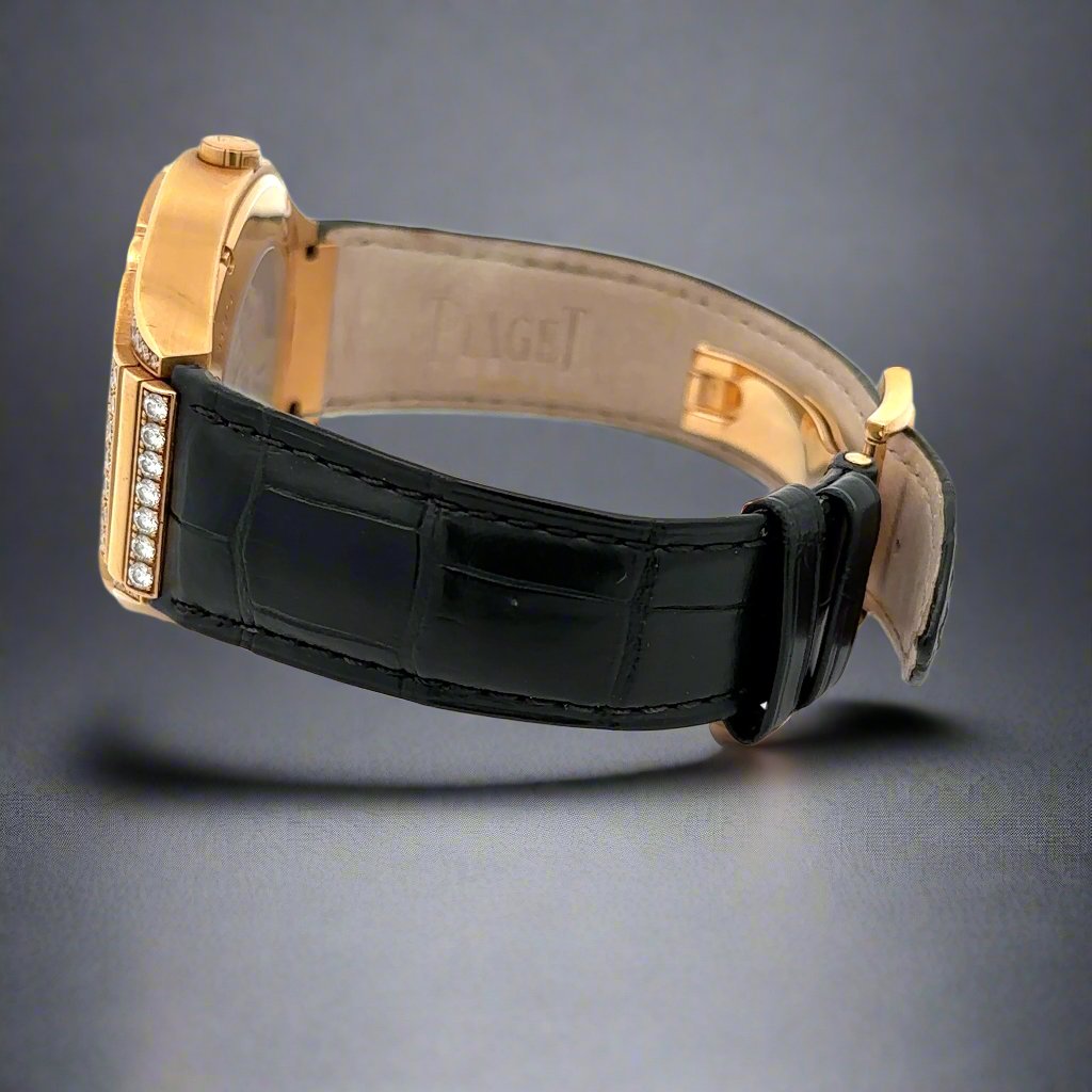 Black leather band of watch with Piaget embossed on band