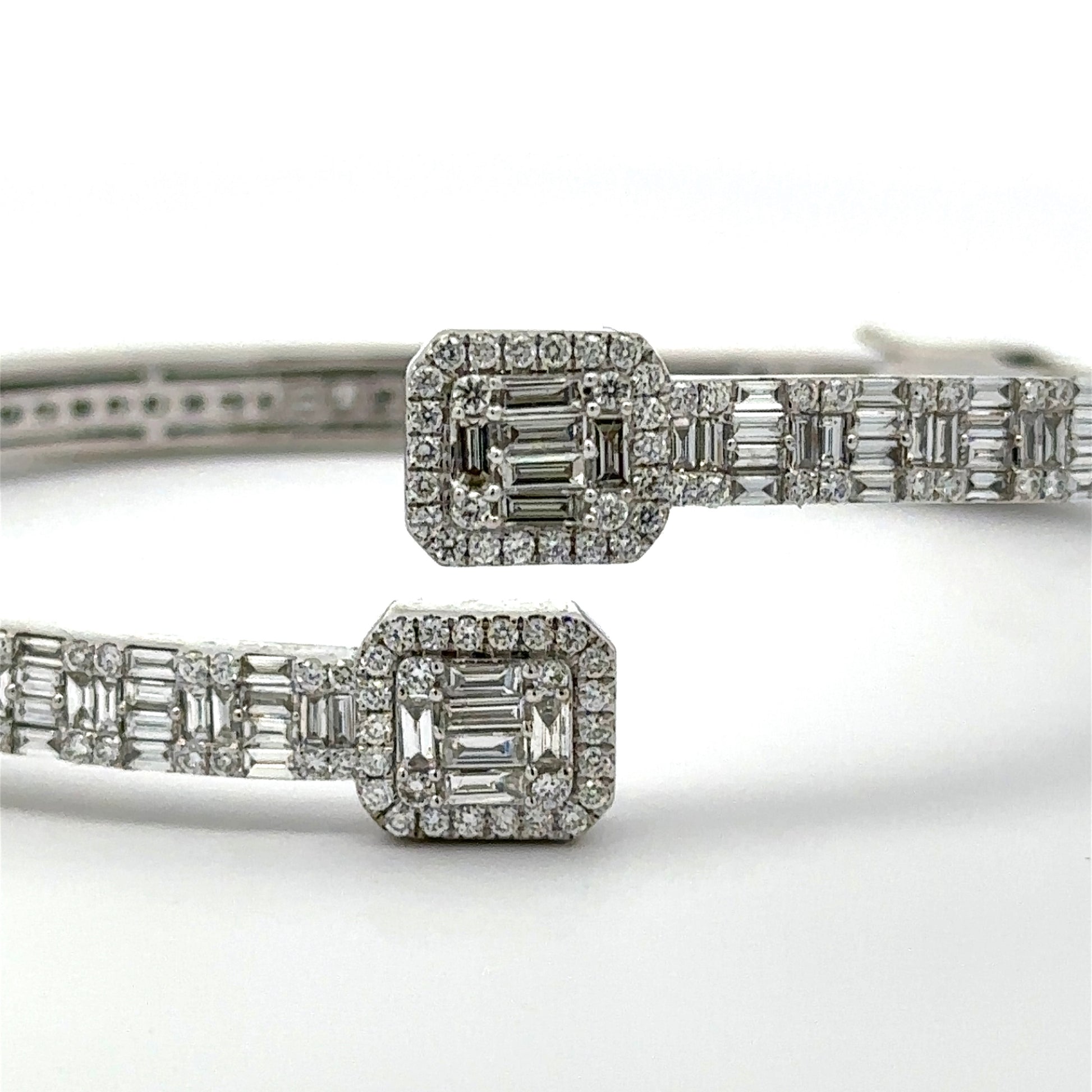 Close up of diamond baguette and round open cuff bangle