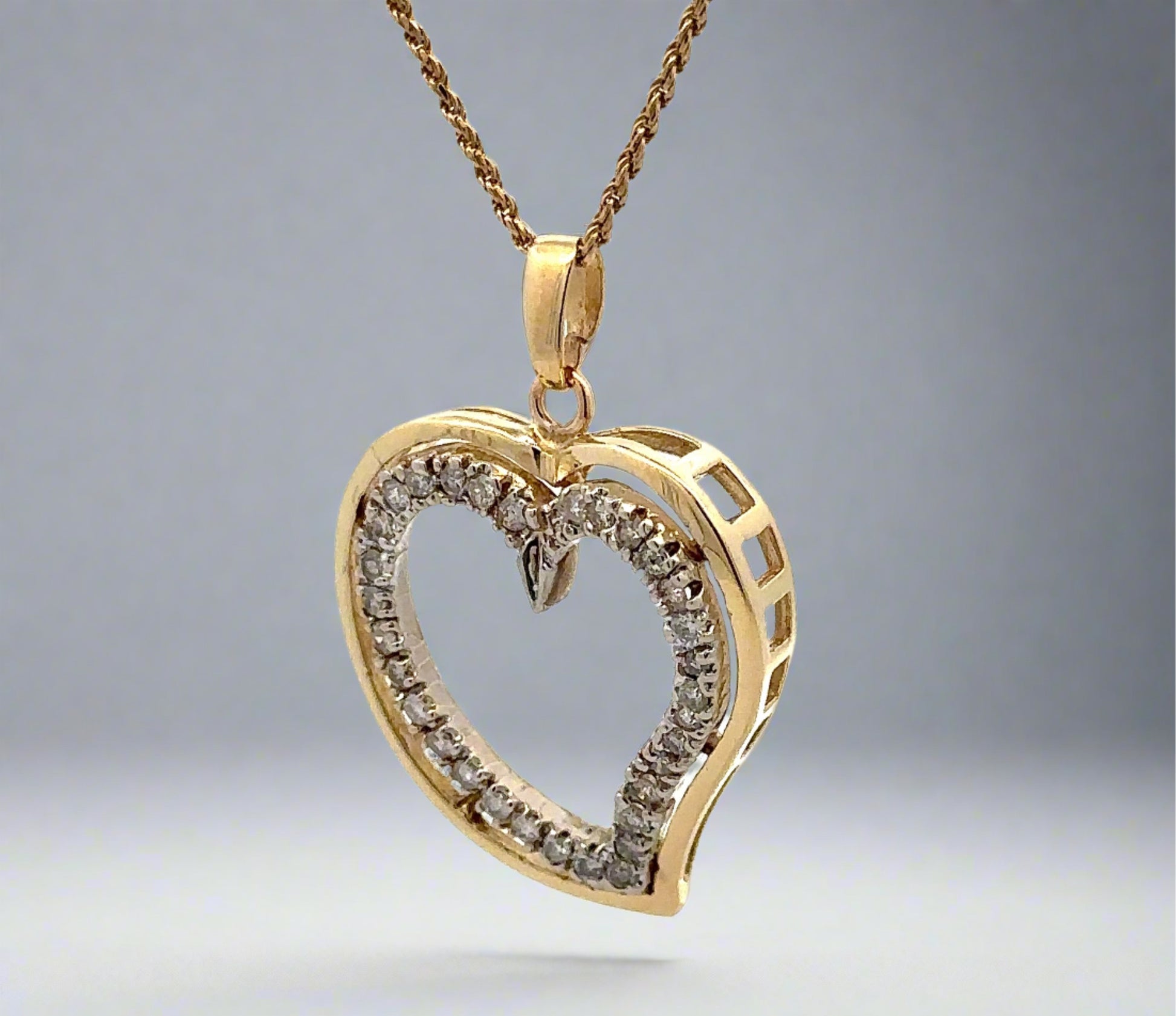 Diagonal view of diamond heart necklace