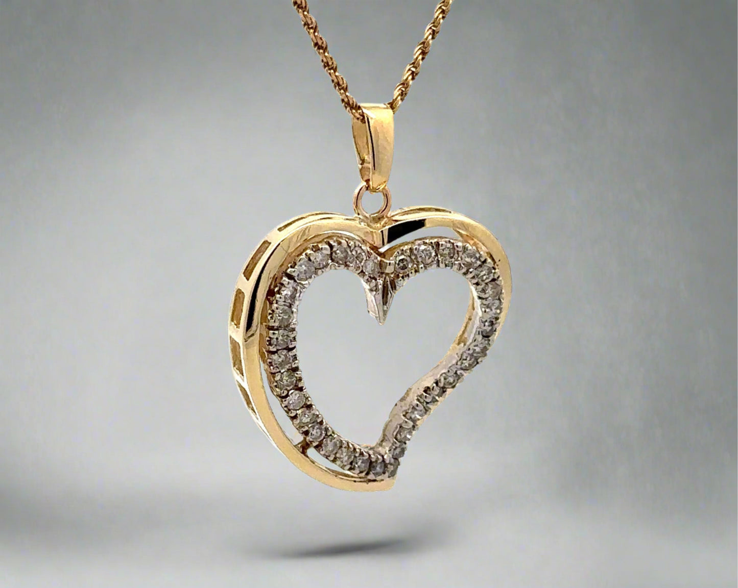 Diagonal view of diamond heart necklace