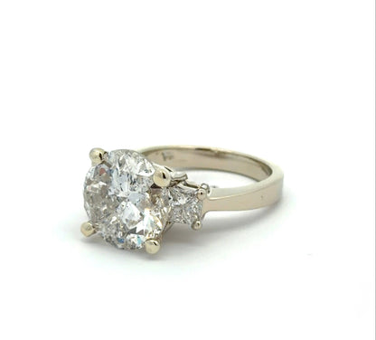 Diagonal view of diamond ring on white background