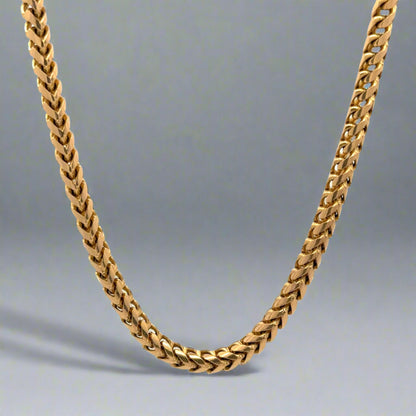 Hanging yellow gold round franco chain