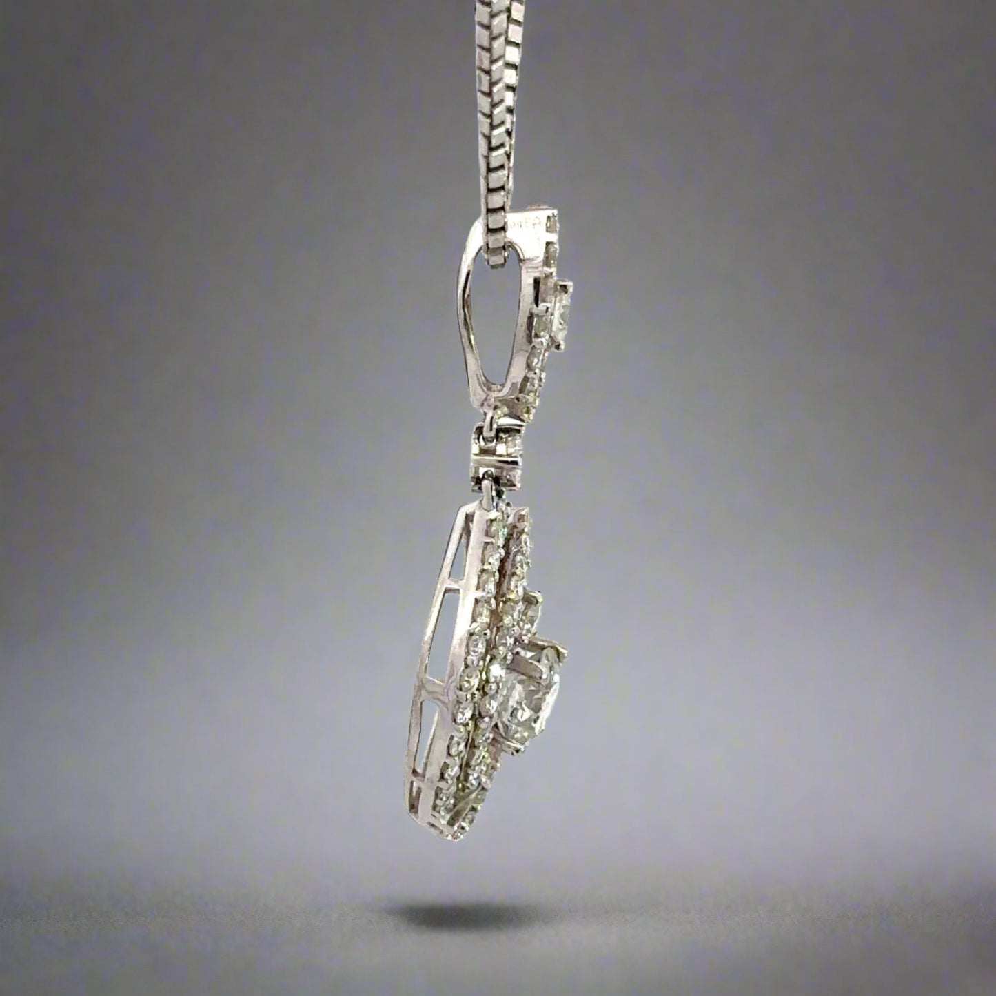 Side of white gold diamond drop necklace