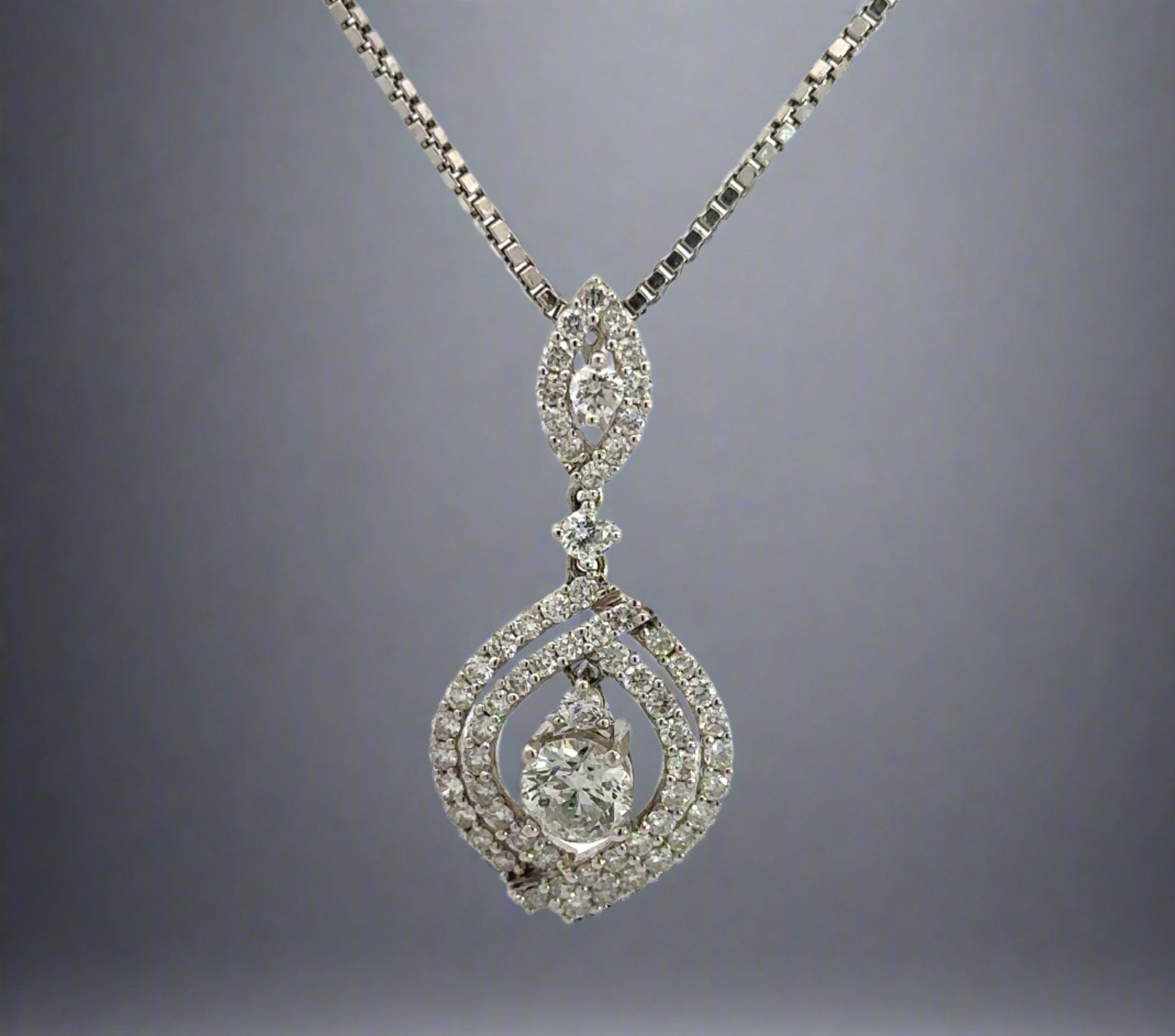 Front of white gold diamond drop necklace