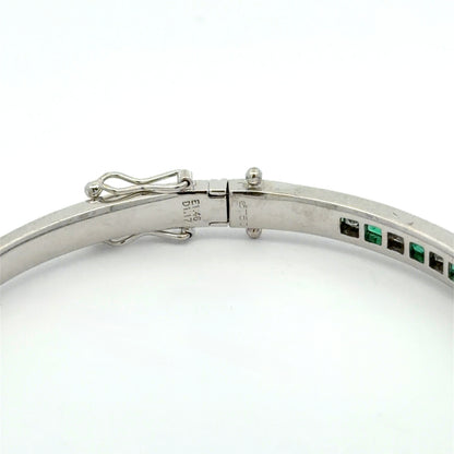 E1.46 D1.17 750 engraved on white gold bracelet
