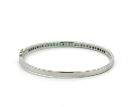 Back of white gold bangle bracelet with no stones on the back