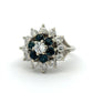 White gold ring with blue gemstones and diamonds on a white background