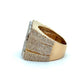 Gold ring with diamond accents on a white background