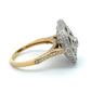 Gold ring with diamond pavé on a white background