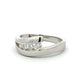 Diagonal view of white gold ring with 4 natural round diamonds on a white background