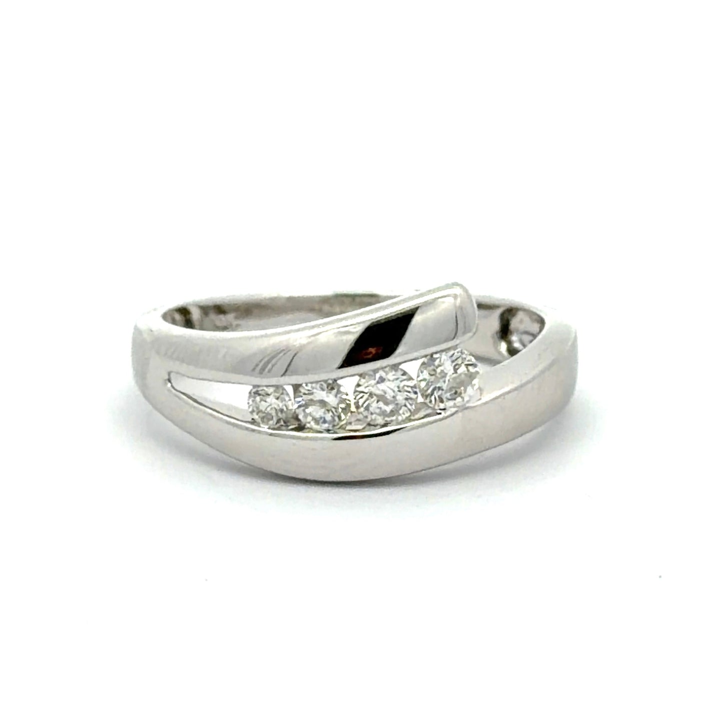 White gold ring with 4 round diamonds on a white background