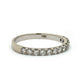 A white gold ring with a row of round-cut diamond on one half, shown against a plain white background. The inside of the band is stamped with '14K'.and 